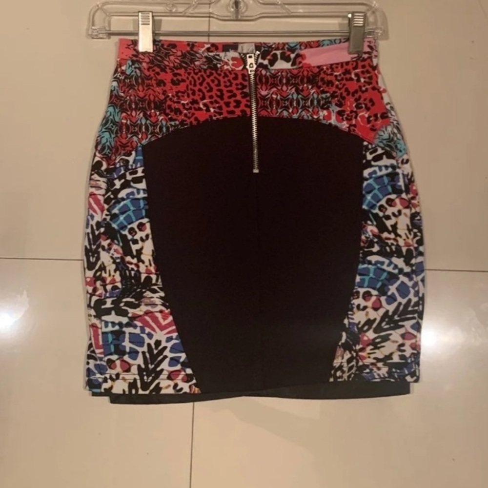 BEBE Petite Black Mini skirt.